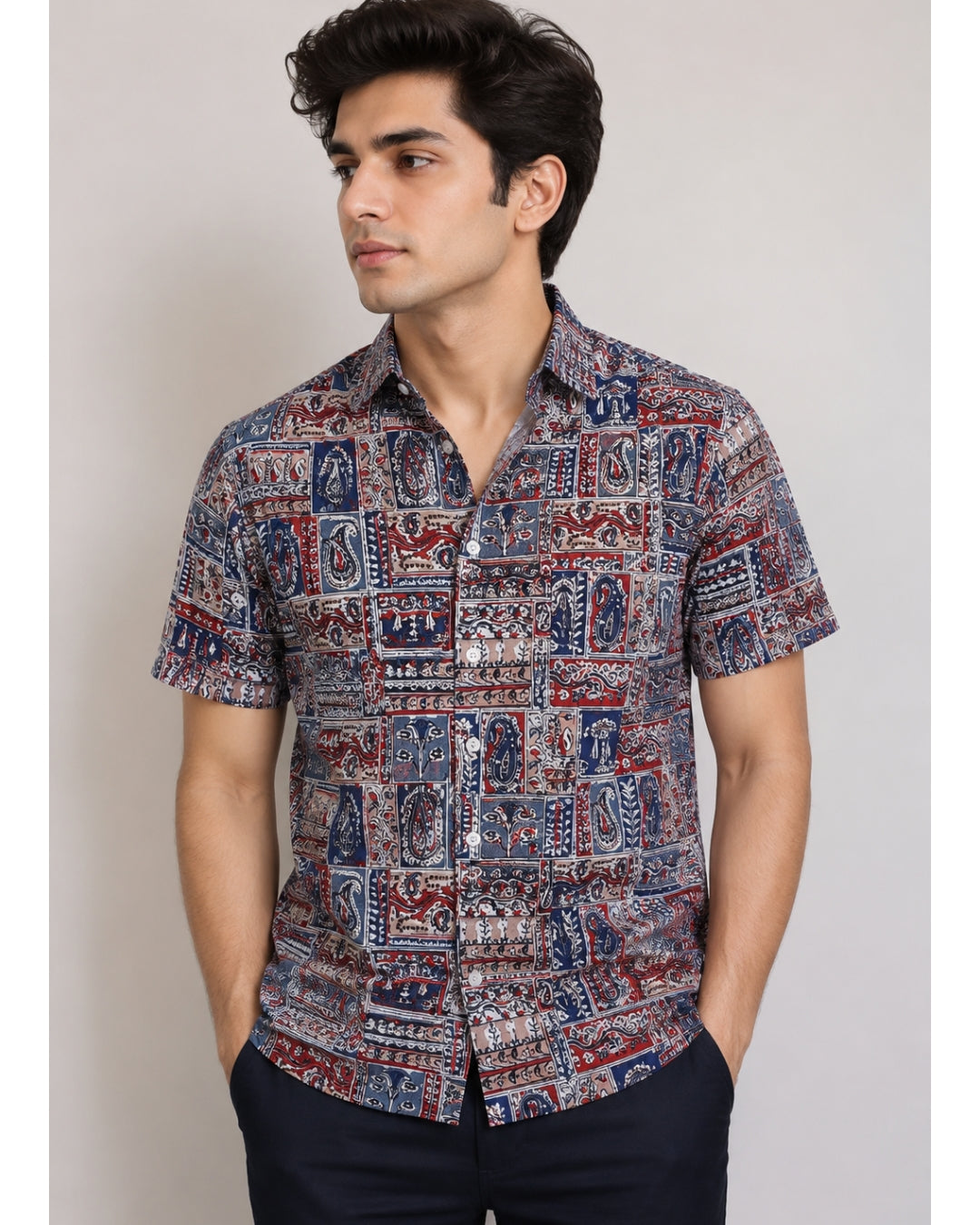 Men's blue and red paisley printed cotton half sleeve shirt worn by a model